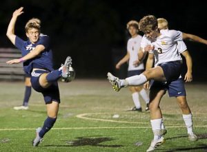 Shaler's Alex Gaetano gets his foot on an attempted clearance by Mars' Jackson Zimsak on Tuesday, Oct. 14, 2025 at Biles Field.