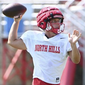 North Hills quarterback Kelly McCarthy throws a pass during a preseason practice.
