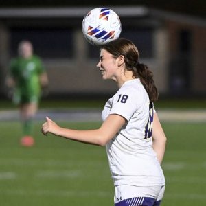 Plum’s Olivia Bigger connects on a header against Franklin Regional on Sept. 22.