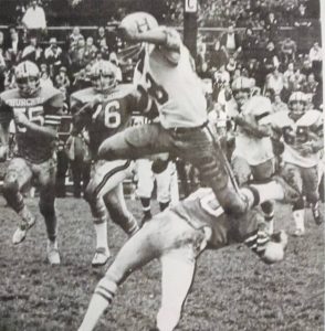 Highlands running back Kevin Johnson leaps over a Churchill defender for a 19-yard gain on Oct. 18, 1975 as the Golden Rams held on for a 14-13 home victory.