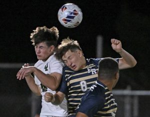 Franklin Regional’s Joey Benson fights for the ball with Belle Vernon’s Jesse Sobczak on Oct. 2, 2025 at Franklin Regional High School.