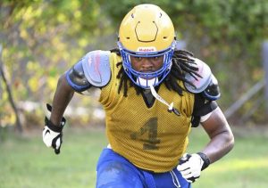 Westinghouse’s Josiah Collins runs during a preseason practice.
