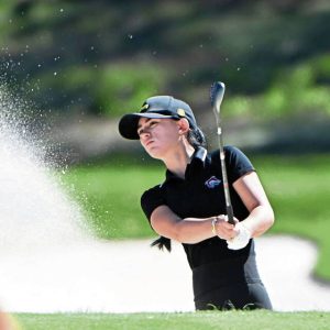 Fox Chapel’s Ava Calandra hits from a bunker on No. 13 during the WPIAL Class 3A girls golf championship on Oct. 1 at Sewickley Heights Golf Club.