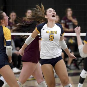Mars’ Rylee Wooldridge celebrates after defeating Beaver in the first set of a PIAA Class 3A semifinal last season.