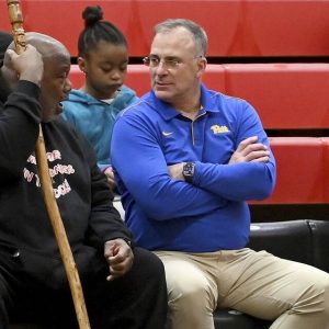 Pitt head football coach Pat Narduzzi talks with Aliquippa defensive coach Peep Short during the Qups’ basketball game against Shenango on Wednesday, Jan. 18, 2023, at Aliquippa High School.