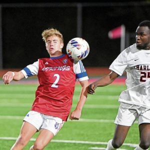 Mt. Pleasant’s Lukas Showman works against Charleroi’s Steve Casimir during their game on Tuesday, Oct. 14, 2025, at Mt. Pleasant.