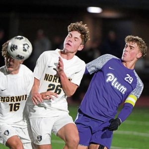 Norwin’s Jack Lepore (26) and Joey Walton battle Plum’s Austin Kolankowski for possession during their game on Thursday, Oct. 9, 2025, at Plum.
