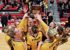 North Allegheny celebrates with the trophy after beating North Catholic during the WPIAL Class 4A girls volleyball championship Nov. 2, 2024 at Peters Township High School.