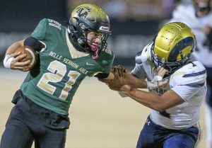 Belle Vernon’s Chace Petrosky stiff-arms Ringgold’s Amoni Ward on Friday.