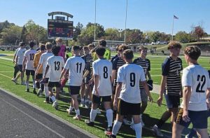 Montour and Franklin Regional boys soccer players go through the postgame handshake line Saturday at Panther Stadium in Murrysville. Franklin Regional won, 2-0.