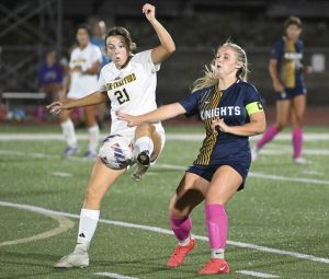 Norwin’s Ava Bobby fights for the ball with Penn-Trafford’s Ellie Lebe on Oct. 6, 2025 at Norwin High School.