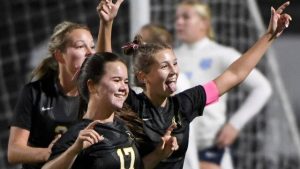 Quaker Valley’s Rowan Wallace celebrates her goal with Ariana Bosh and Annabel Miko during their game against Central Valley on Oct. 8 in Leetsdale.