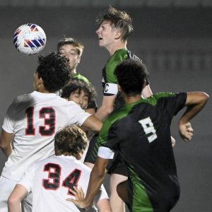Pine-Richland’s Ryan Cashman battles Fox Chapel’s Eli Ramirez for a header Sept. 4.