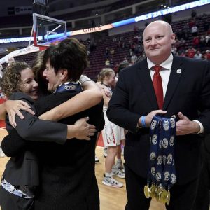 Outgoing WPIAL president Scott Seltzer (right), seen handing out gold medals in 2022, said he’d be interested in staying connected to education as a school district consultant or interim administrator.