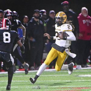 Montour quarterback Brandon Bennett carries down the Aliquippa sideline on Friday, Oct. 17, 2025, at Heinz Field.