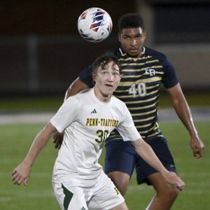 Penn-Trafford’s Noah Haslam works against Franklin Regional’s Thomas Bridges during their game on Tuesday, Sept. 23, 2025, in Murrysville.