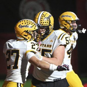 Montour’s Caden Halajcio celebrates with Jacob Halbedl after scoring a fourth quarter touchdown on Friday, Oct. 17, 2025, at Aliquippa.