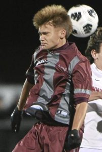 Beaver's Anthony Furda heads a ball last season against Avonworth.