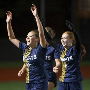 Norwin’s Leesia Phetsomphou (left) celebrates with Neeve Graham after scoring with 46 seconds remaining in double overtime in their WPIAL Class 4A quarterfinal against Mt. Lebanon on Thursday.