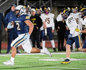 Norwin’s Giovanni Rothrauff takes off on a long first-quarter run to set up a touchdown against Mt. Lebanon on Friday.