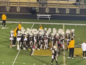 Highlands players huddle before the start of Friday night's game against Valley.