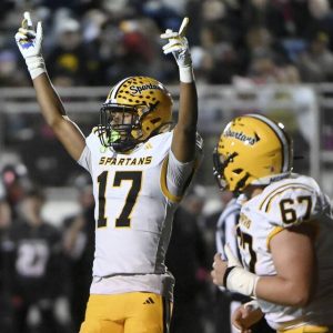 Montour’s Archie Collins celebrates after scoring his first touchdown against West Allegheny on Friday, Oct. 24, 2025, in North Fayette.