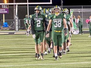 Players from Seton LaSalle take the field before their game against Washington on Oct. 24, 2025, at Dormont Stadium.
