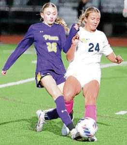 Plum's Emily Grubich and Mars' Addison Orehowsky battle for possession during a WPIAL Class 3A quarterfinal Thursday, Oct. 23, 2025.
