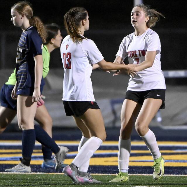 Peters Township’s Brynn Busch (7) celebrates with Marina Hajnosz after scoring against Mt. Lebanon during their game on Monday, Oct. 6, 2025, in Mt. Lebanon.
