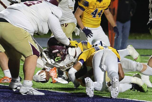Steel Valley’s Da’Ron Barksdale lunges into the end zone against South Allegheny on Friday.