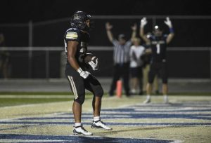 Kiski Area’s Ashton Taylor celebrates his touchdown against Knoch on Aug. 22.