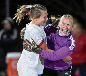 Burrell goalkeeper Leah Waldsmith celebrates with Mikayla Coury after defeating Mt. Pleasant in their WPIAL Class 2A semifinal on Tuesday, Oct. 28, 2025, at Gateway.
