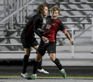 Fox Chapel’s Jake Williams (left) celebrates with Rocco DiDomenico after scoring against Plum in their WPIAL Class 4A semifinal on Tuesday, Oct. 28, 2025, at Gateway.