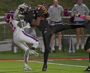 Southmoreland’s Averyon Darnell intercepts a pass intended for Mt. Pleasant’s Jonah Townsend on Oct. 6 at Russ Grimm Field.