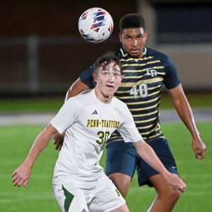 Franklin Regional’s Thomas Bridges (back) works against Penn-Trafford’s Noah Haslam during a match earlier this season.