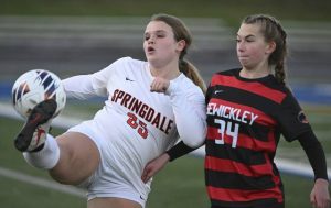Springdale’s Makenna Haas battles for the ball with Sewickley Academy’s Sarah Merryman during a WPIAL Class A semifinal Tuesday.