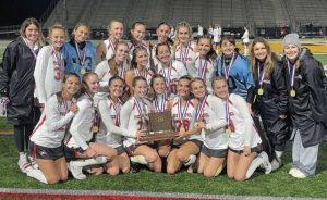 Members of the Fox Chapel field hockey team pose with the trophy after capturing the WPIAL championship Wednesday.