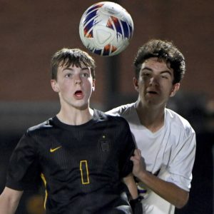 Bentworth’s Adam Moessner battles OLSH’s Andre Kolocouris for possession during the WPIAL Class A championship game Oct. 31, 2024 at Highmark Stadium.
