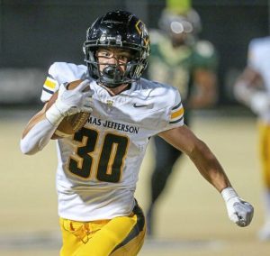Thomas Jefferson's Tyler Eber runs with the ball against Belle Vernon on Friday, Sept. 26, 2025.