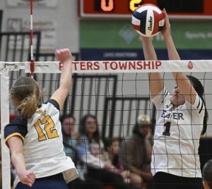 Beaver’s Kayden Blinn blocks the shot of Mars’ Lily Javor during the WPIAL Class 3A girls volleyball championship Nov. 2, 2024 at Peters Township High School.