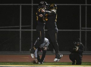 Thomas Jefferson’s Dylan Beasock (right) celebrates with Kane Eggerton after Eggerton’s touchdown agains Mars during the WPIAL Class 4A quarterfinals Friday, Oct. 31, 2025, at Thomas Jefferson Stadium.