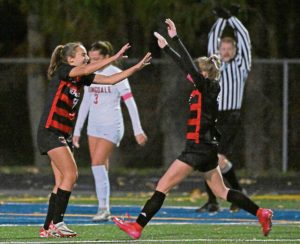 Sewickley Academy’s Makenzie Dice (right) celebrates with Emma Eannarino after Eannarino’s goal against Springdale during the WPIAL Class A semifinals Oct. 28 at Hampton.