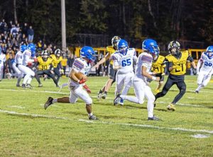 Jeannette’s Dhestin Sanders (13) looks for running room against Bentworth during their WPIAL first-round playoff game Friday.