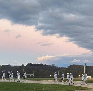 Beaver players head to the locker room after warmups before their WPIAL Class 3A playoff game at Freeport on Friday.