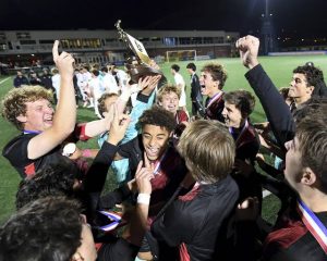 The Fox Chapel boys soccer team celebrates with the WPIAL championship trophy after defeating Seneca Valley in the Class 4A final on Friday, Oct. 31, 2025, at Highmark Stadium.