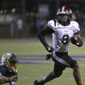 Aliquippa’s Akiva Woods scored on a 70-yard run in Friday’s victory.