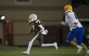 Highlands’ Jamarcus Prager moves the ball up field against Derry on Friday at Highlands’ Golden Ram Stadium.