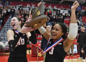 Avonworth captains Julia Cernich and Jada Taylor (right) with the trophy after beating Hopewell in the WPIAL Class 2A volleyball championship Saturday Nov. 1, 2025 at Peters Township High School.