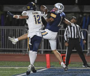 Mt. Lebanon’s Kevin King defends a pass interned for Norwin’s Jake Knight on Oct. 24.