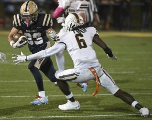 Freeport’s Amos Glenn cuts back on Highlands’ Marqis Johnson on Oct. 3, 2025 at Freeport Area High School.